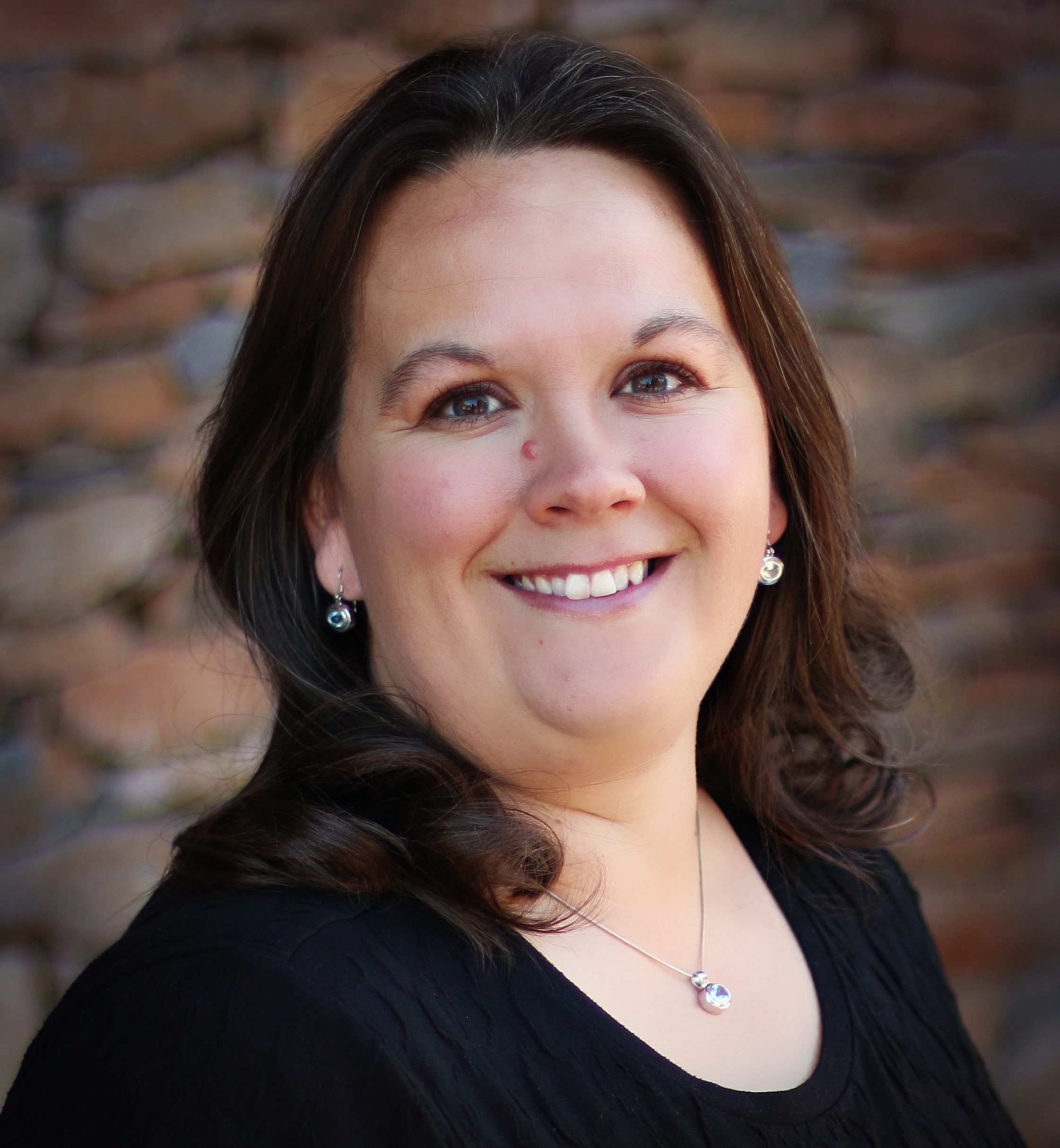 A headshot of Jennifer Berry, Financial Oversight Analyst for the College of Education and the Cline Library at Northern Arizona University