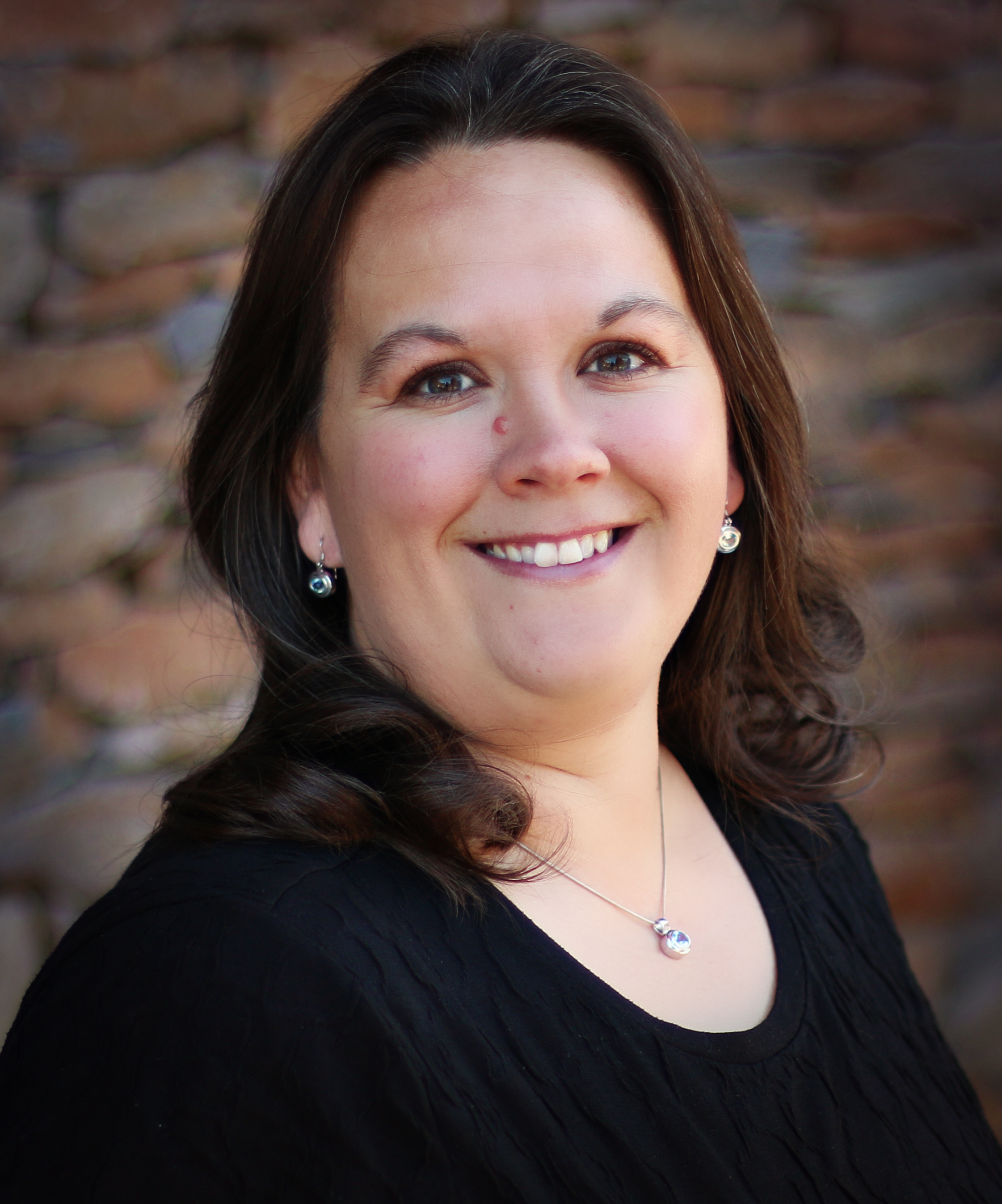 A headshot of Jennifer Berry, Financial Oversight Analyst for the College of Education and the Cline Library at Northern Arizona University