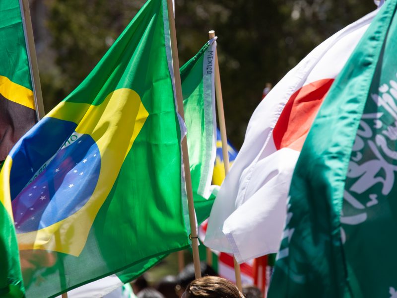 International flags are waved in the air.