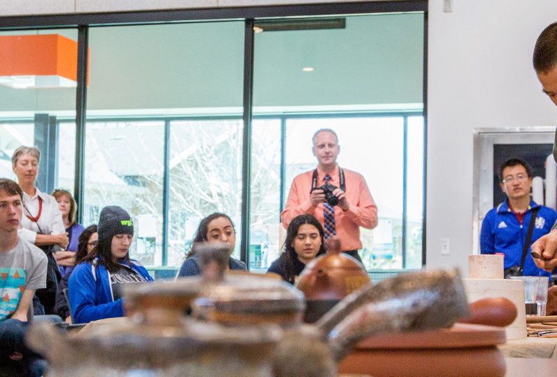 Students watching a faculty member.