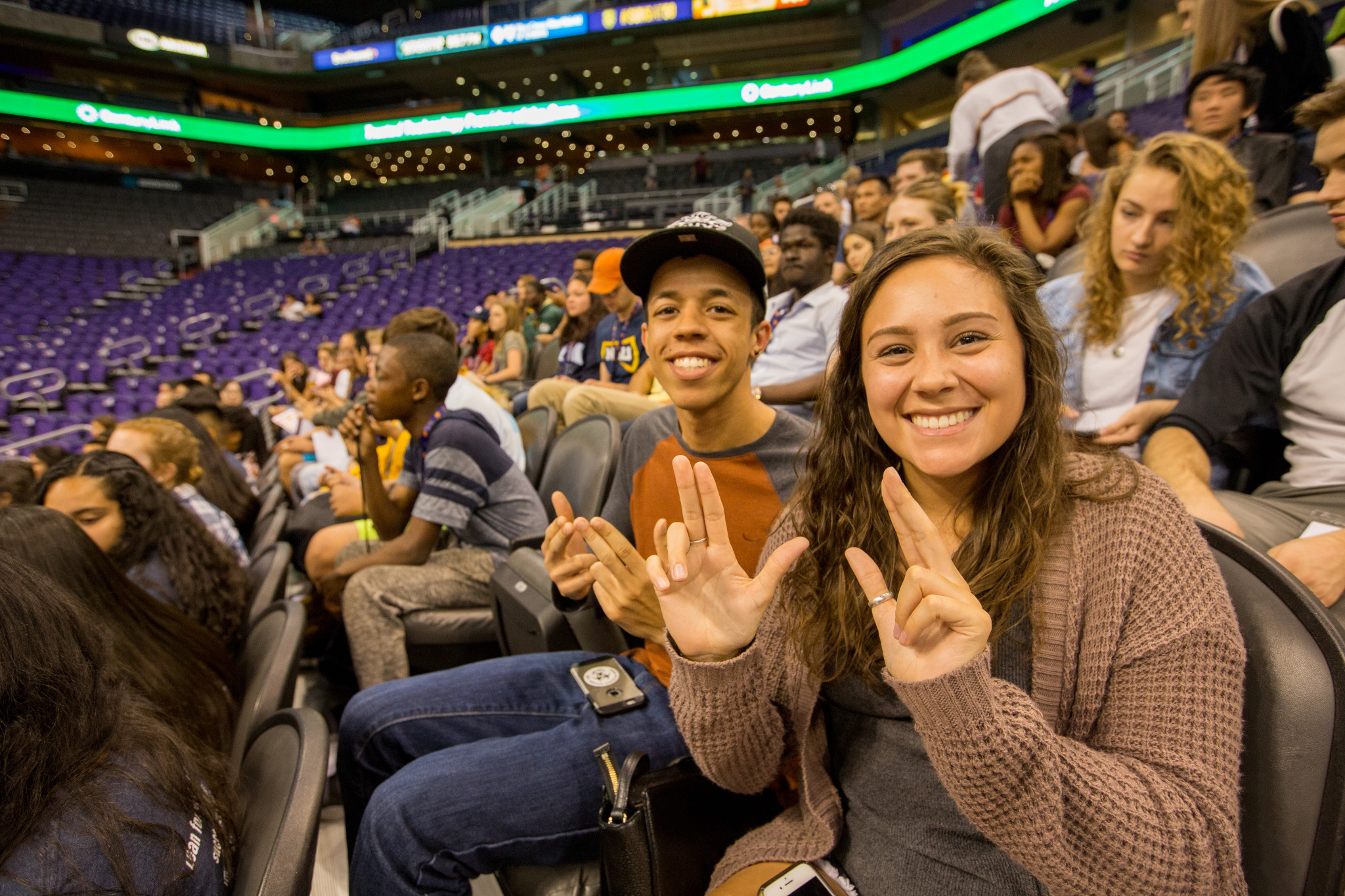 N A U students putting up their PJs in an arena.