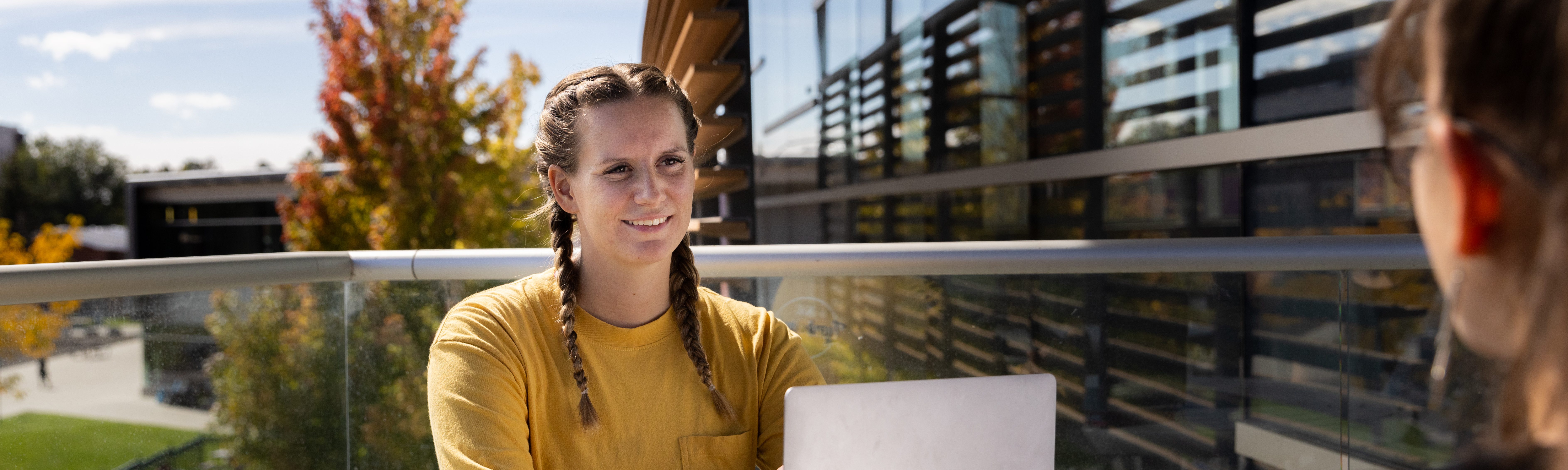Students collaborating outside.