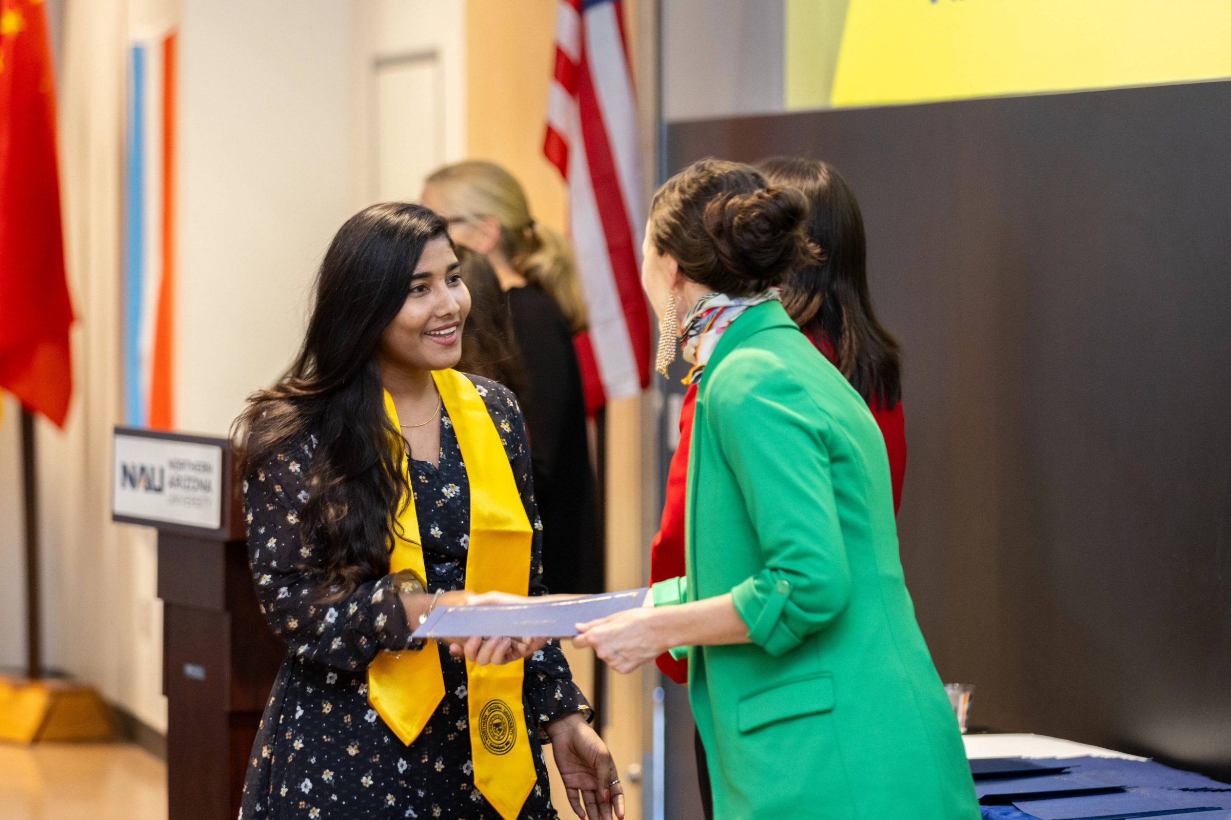 A student receiving a certificate.