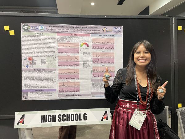 Tatum and her poster presentation.