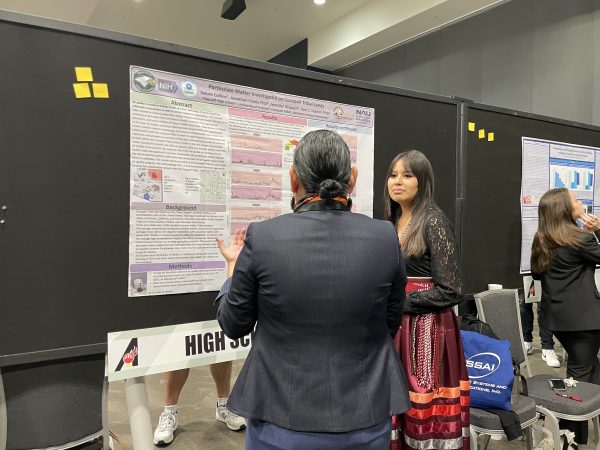 Tatum and her poster presentation.