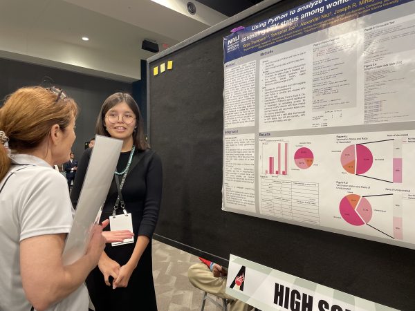 Kayla and their poster presentation.