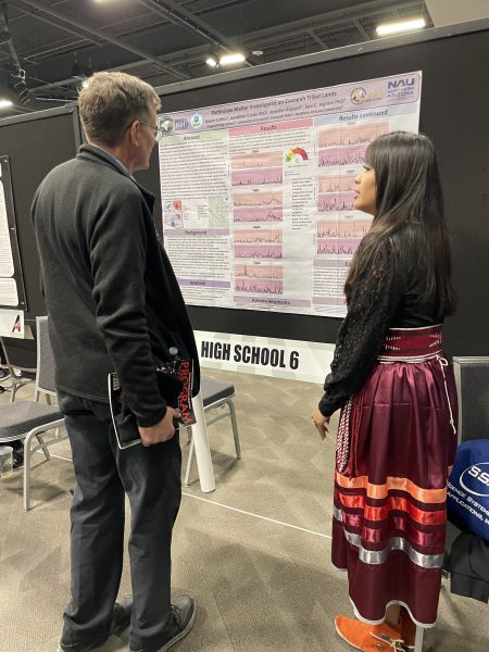 Tatum and her poster presentation.