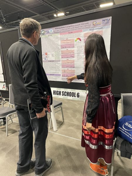 Tatum and her poster presentation.