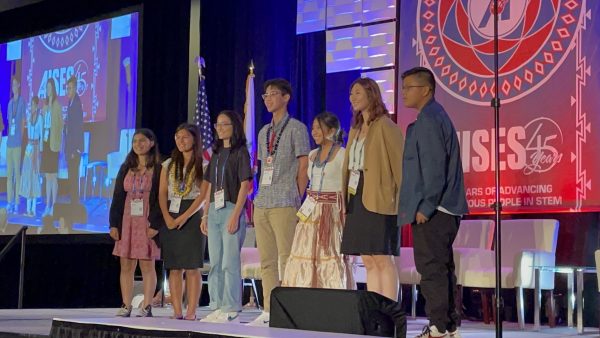 Amber and Izzy receiving their Boeing award.