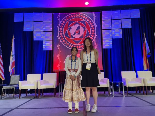 Amber and Izzy receiving their Boeing award.