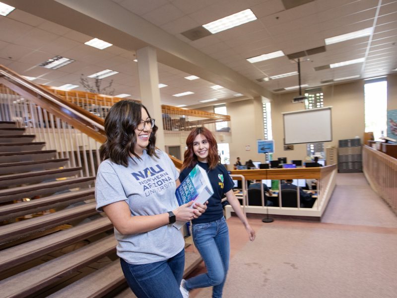 Students walking in Yuma library.