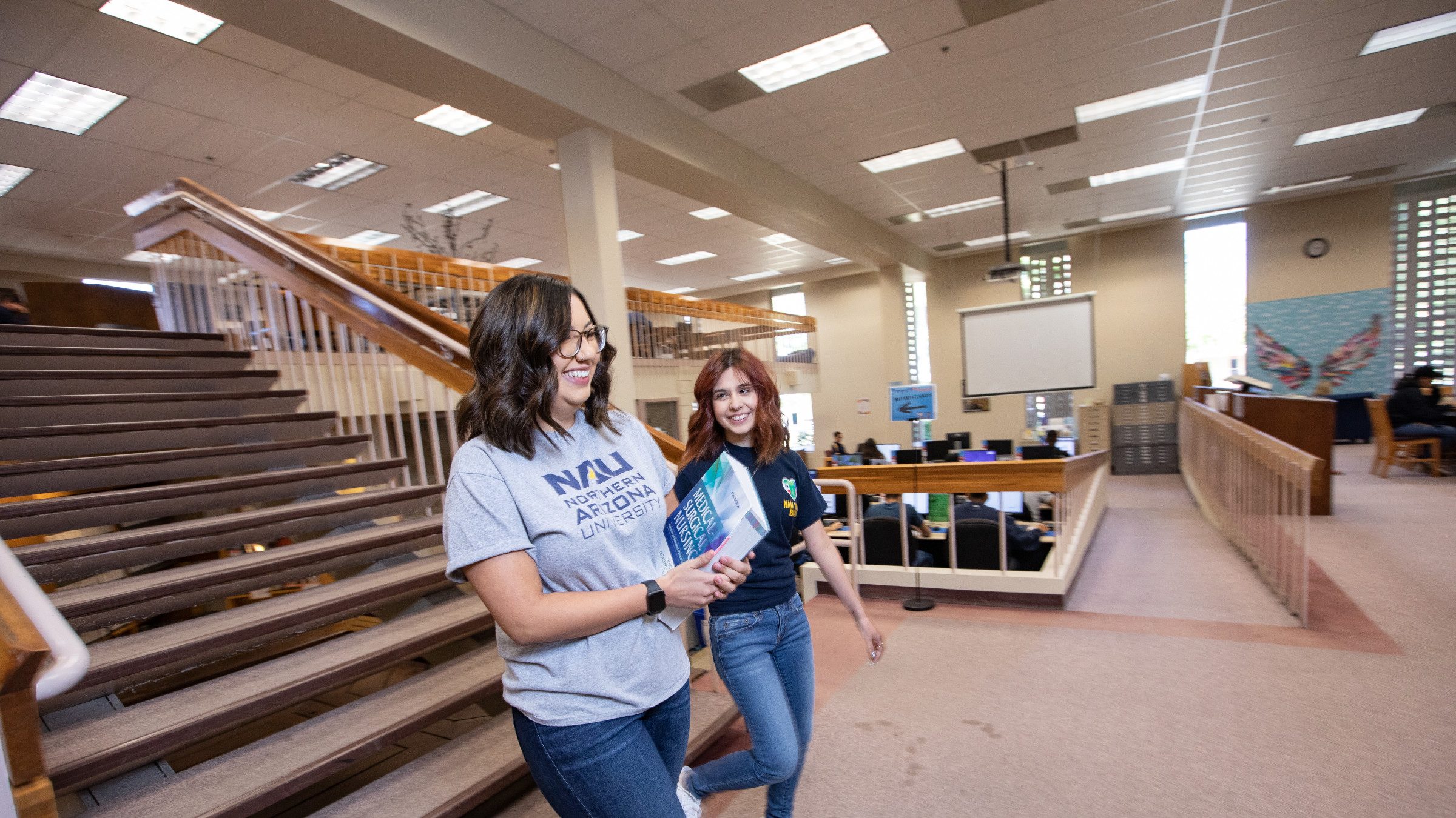 Students walking in Yuma library.