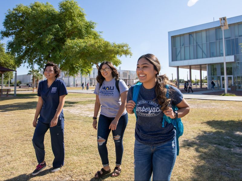 N A U&ndash;Yuma students walking on campus.