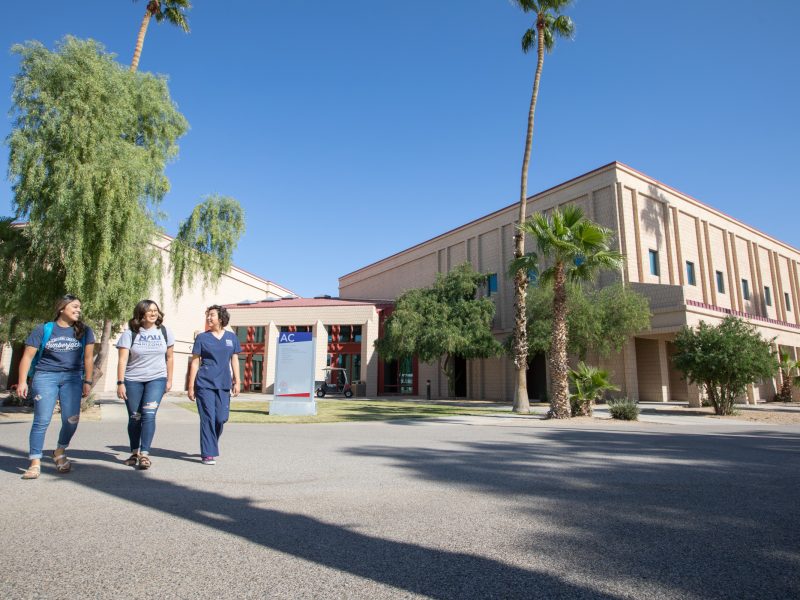 N A U&ndash;Yuma students walking on campus.