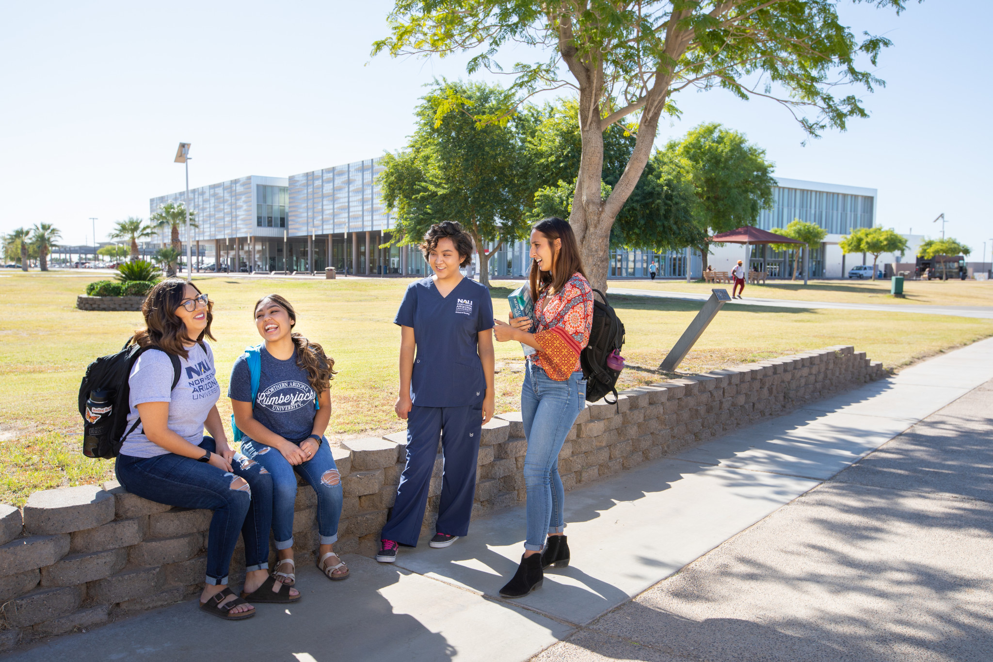 Students hanging out on the N A U&ndash;Yuma campus.