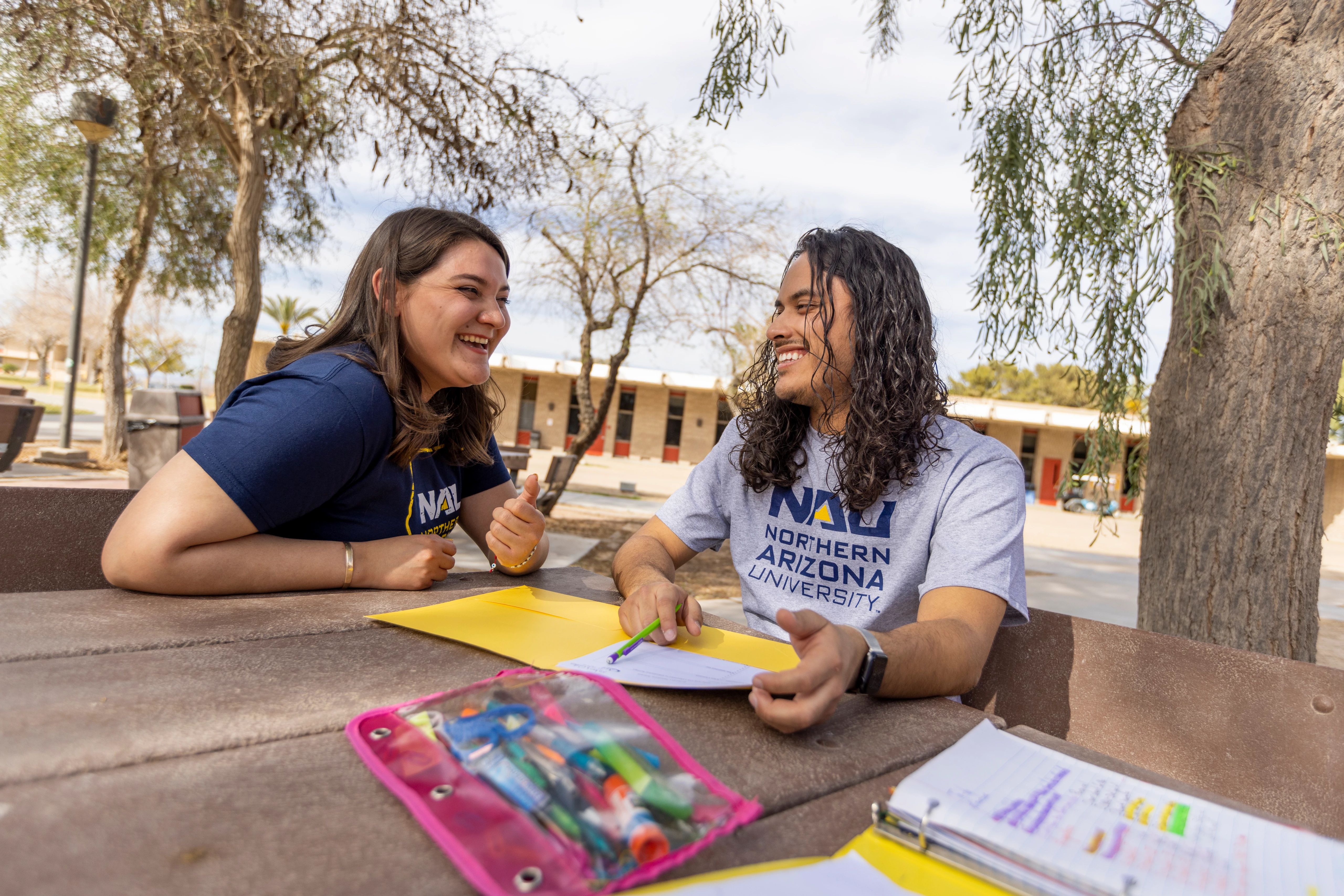 Students working together on the N A U&ndash;Yuma campus.