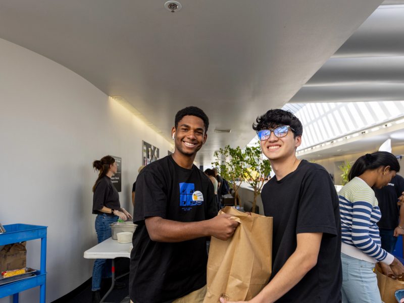 Students participate in Louies cupboard.