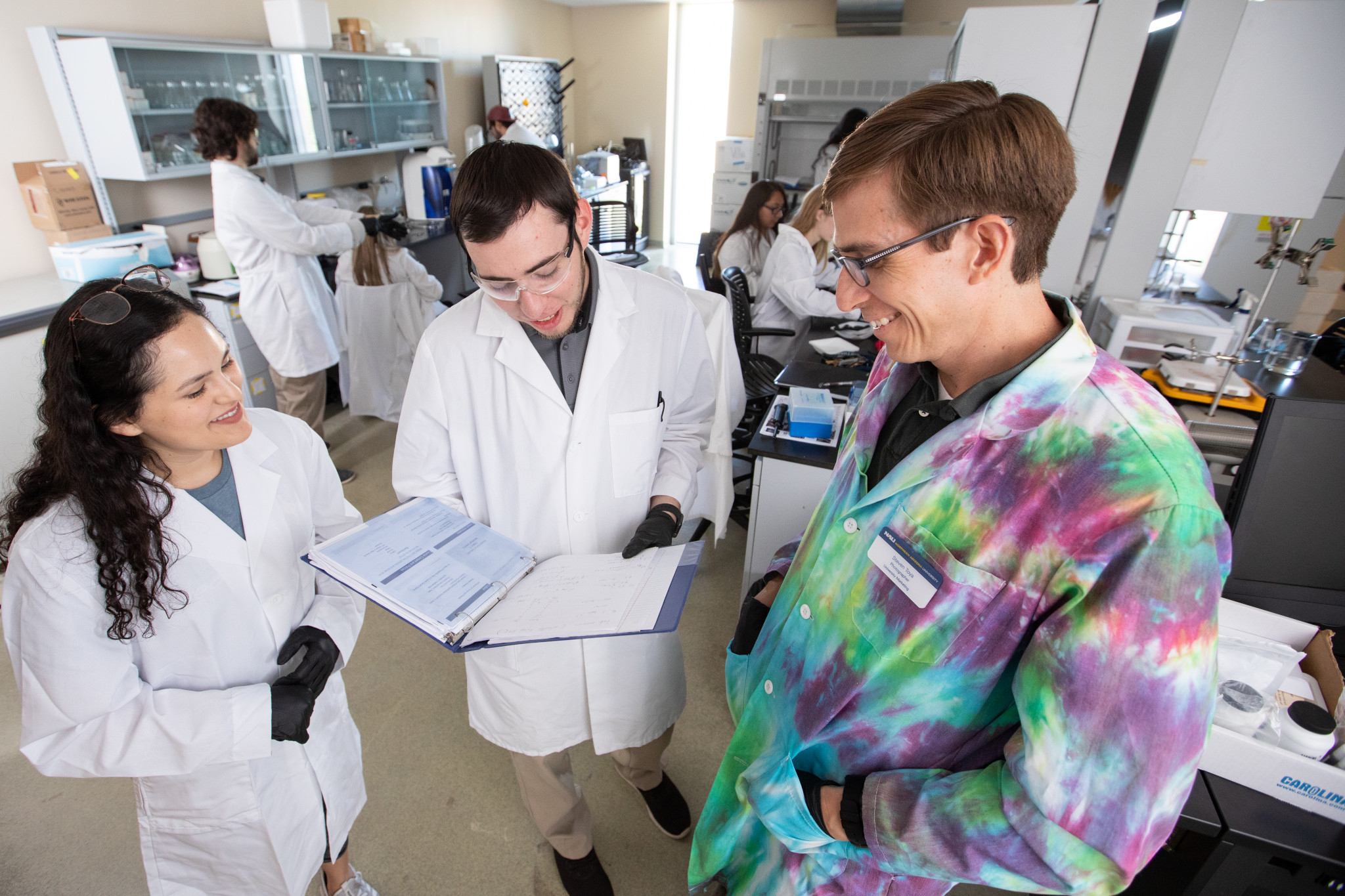 Students working with their professor in a N A U&ndash;Yuma genetics class.