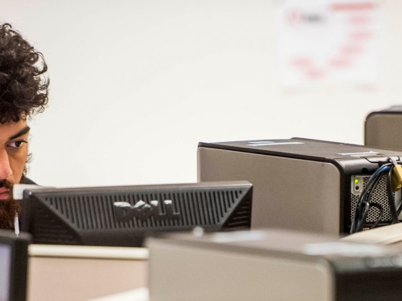 N A U&ndash;Yuma student working on the computer.