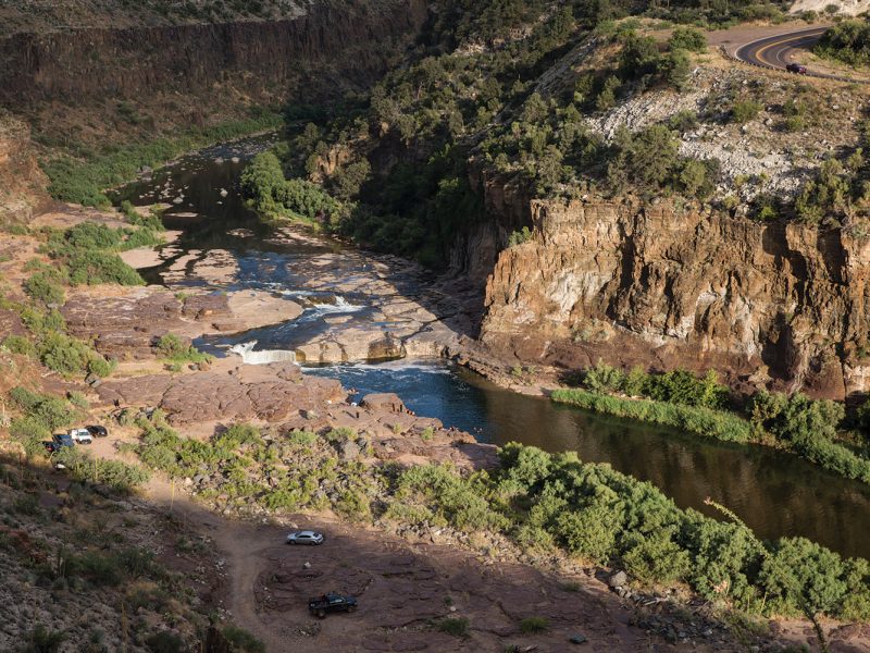 An aerial view of a river flowing through a canyon.
