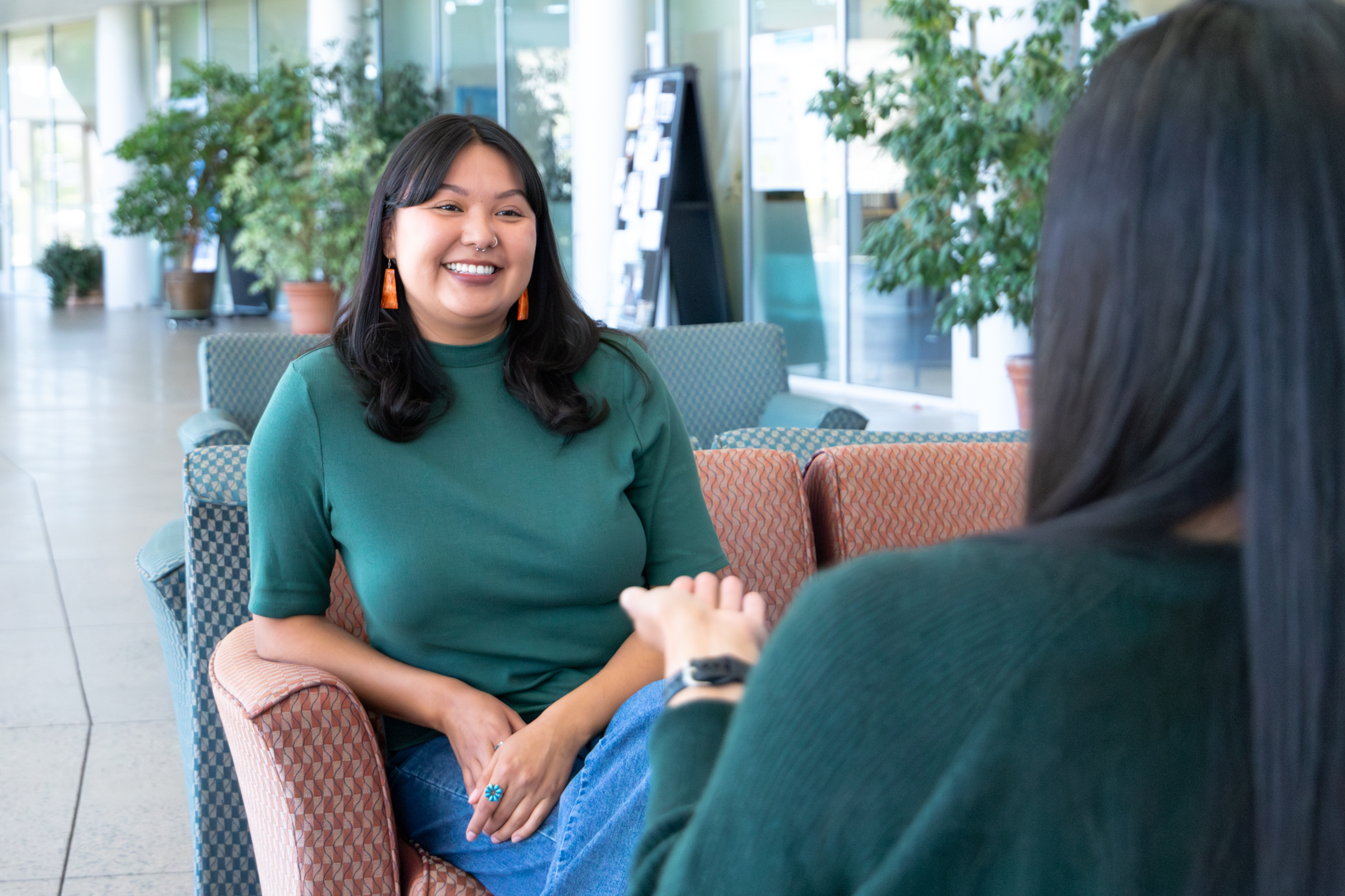 Chassity Begay engaging with a researcher.