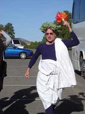 David Bousquet in a toga