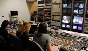 Students working in broadcast studio