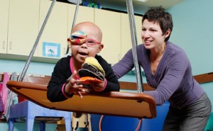 Occupational therapist works with a patient.