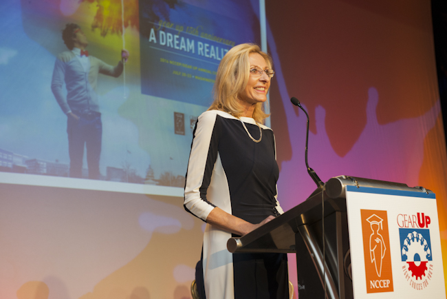Teena Olszewski speaks at the podium at the event