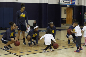 Women's basketball teaches children