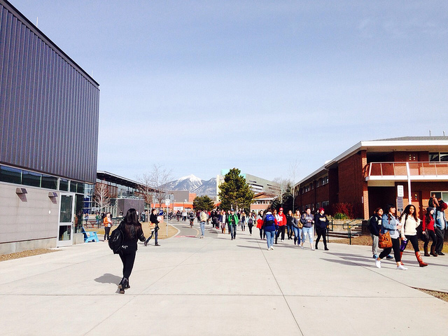 students fill a pedway on campus