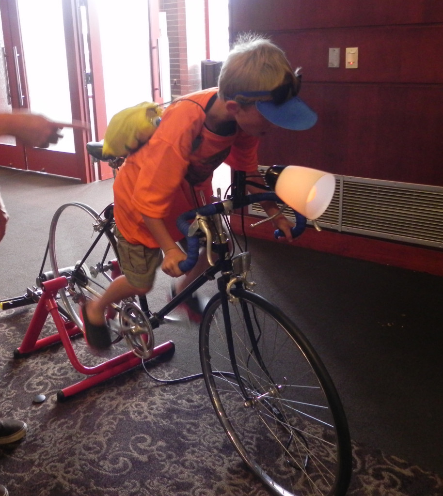 Kid rides a tinkered with bike