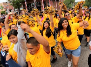 Students wear gold in parade, show pride