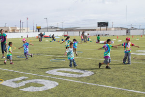 kids spin and play on the field