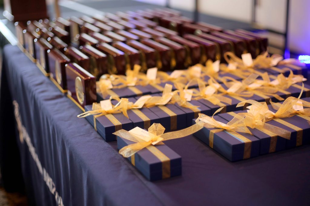 Faculty Awards lain out over the table