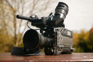 A video camera set down outside