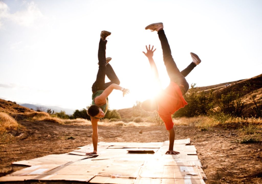 a scene from "Shake the Dust" features two breakdancers