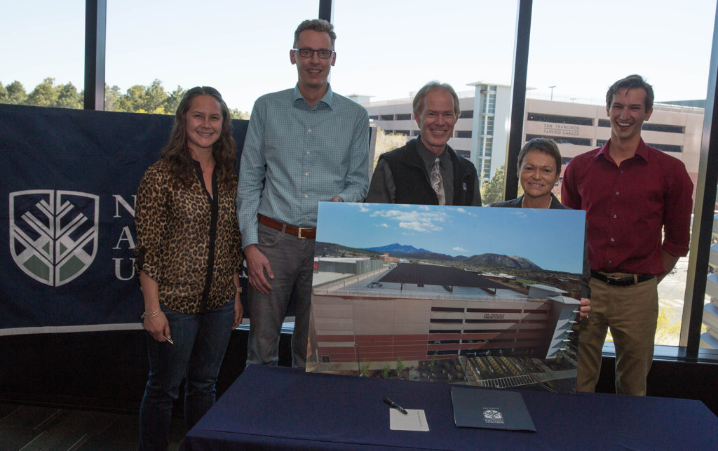 attendees at signing ceremony