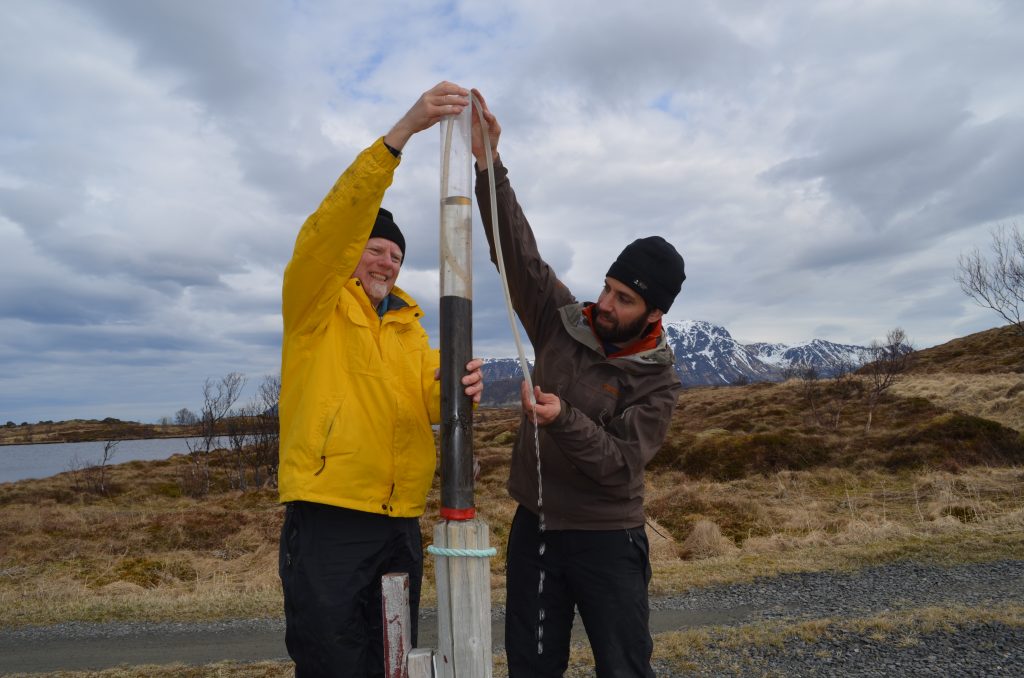 Scott Anderson studying Norway lake mud