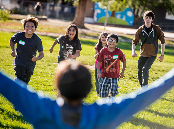 nau-coe-student-teacher-at-recess-with-young-students