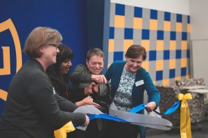 President Rita Chang and COE faculty cut the ribbon to the new classroom