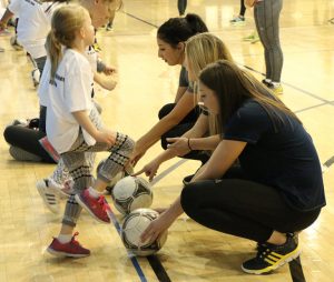 Women in sports teaching the clinic