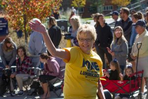 NAU Alumna waves