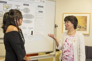 Catherine Propper with student