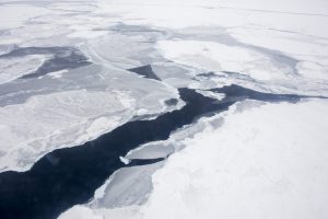A Coast Guard C-130 flies over the Arctic Ocean during an Office of Naval Research-sponsored study of the changing sea ice, ocean and atmosphere. (U.S. Navy photo by John F. Williams/Released)