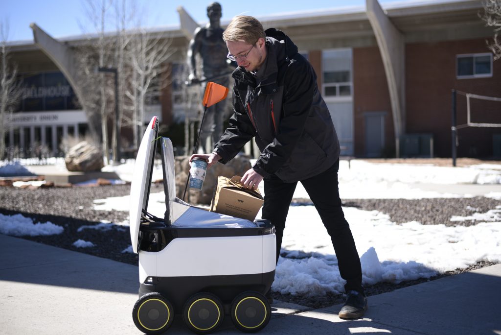Starship robot and student
