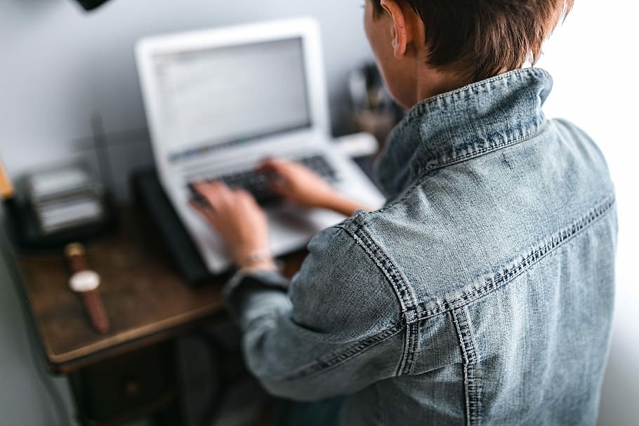 woman works on laptop