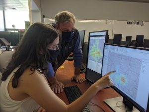 Claire Simchuk and Mark Manone discussing Claire's research