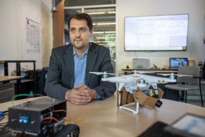 Abolfahl Razi sits with his drones.