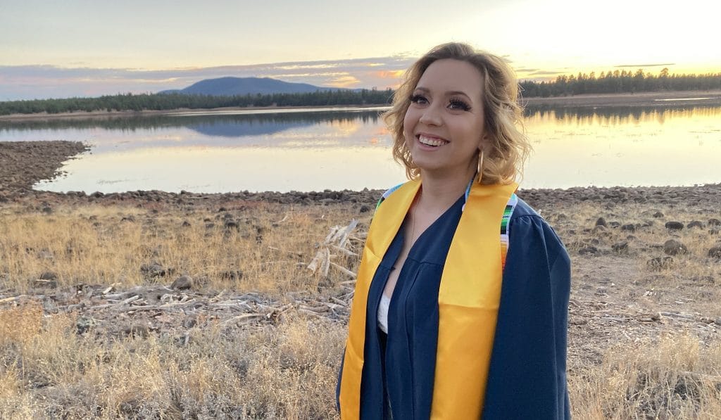 Valeria poses in graduation gown